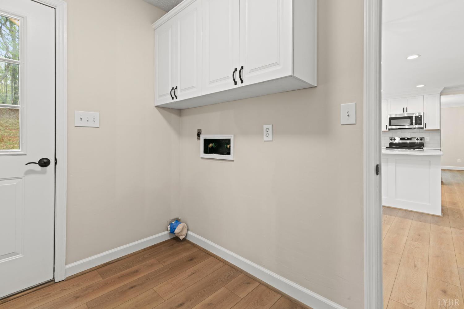 2252 Coffee Road Lynchburg, VA 24503 - Photo 43 of 93 a view of a kitchen with wooden floor and a window