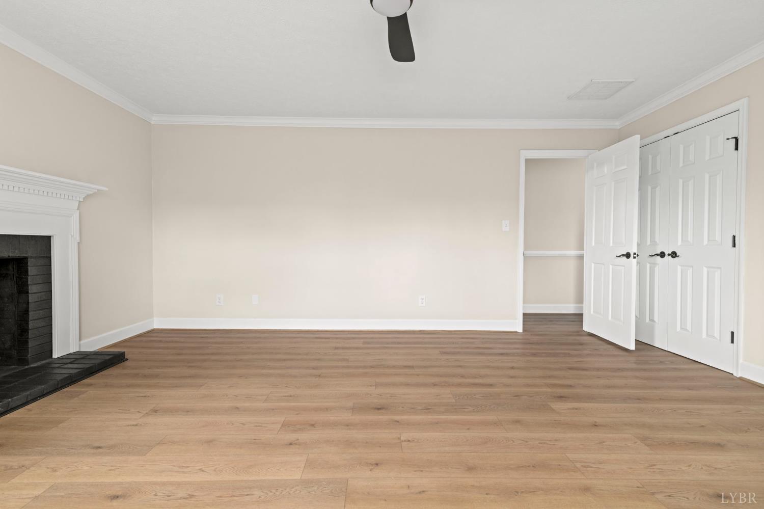 2252 Coffee Road Lynchburg, VA 24503 - Photo 57 of 93 a view of an empty room with wooden floor
