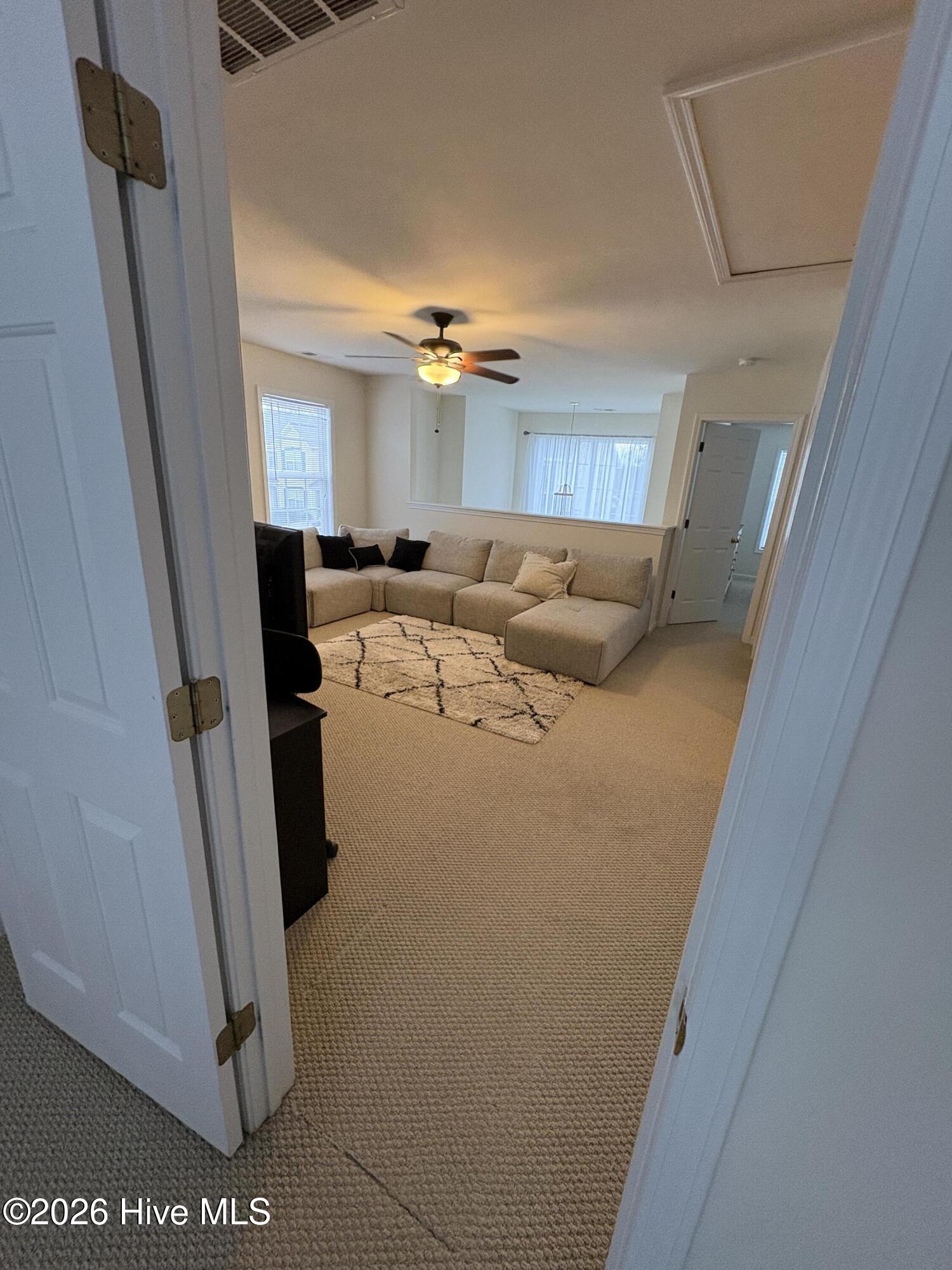 111 Cobblers Circle Calabash, NC 28467 - Photo 10 of 15 Large 2nd. floor Loft area dividing the two 2nd, floor bedrooms.