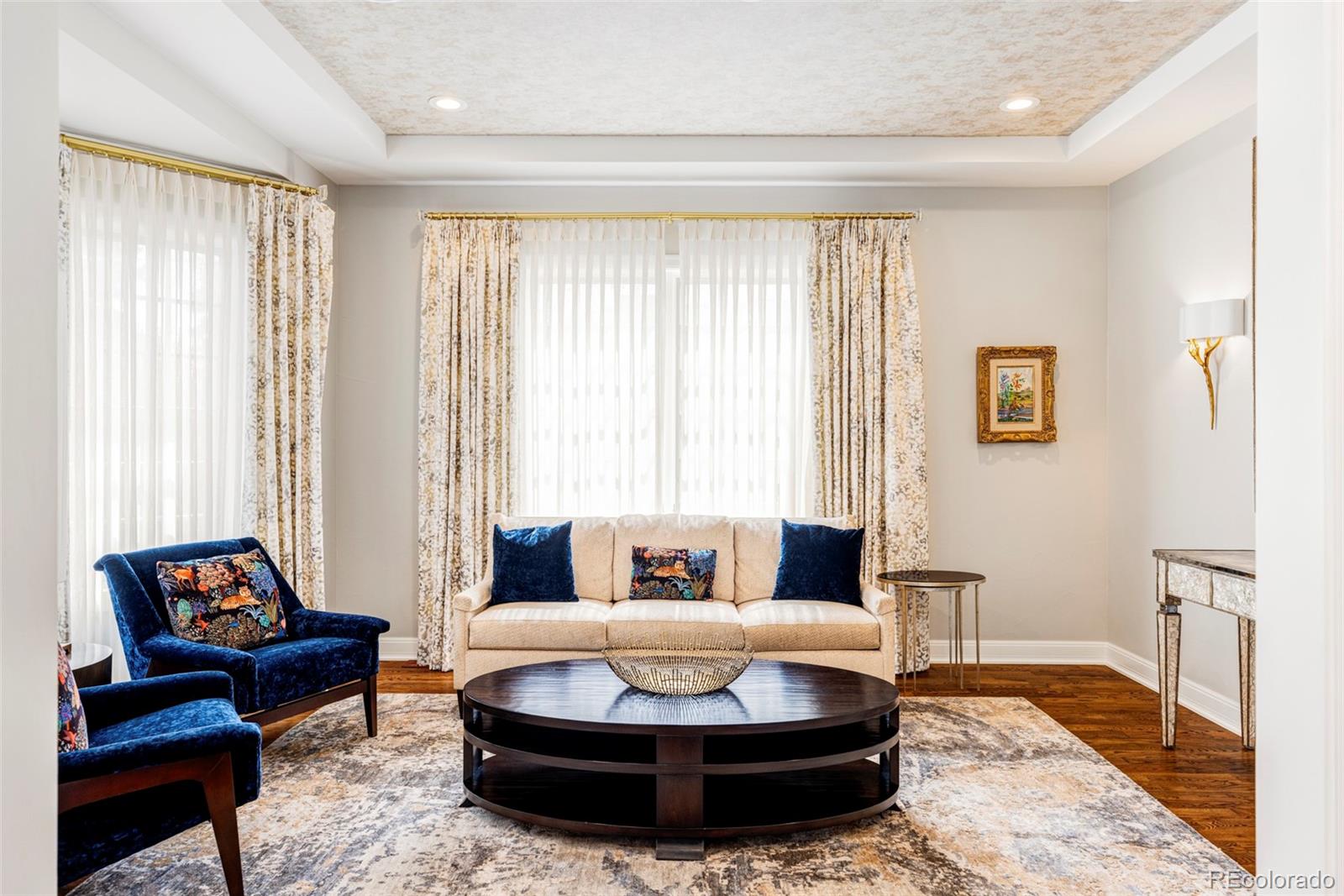 411 Cook Street Denver, CO 80206 - Photo 14 of 40 a living room with furniture and a large window