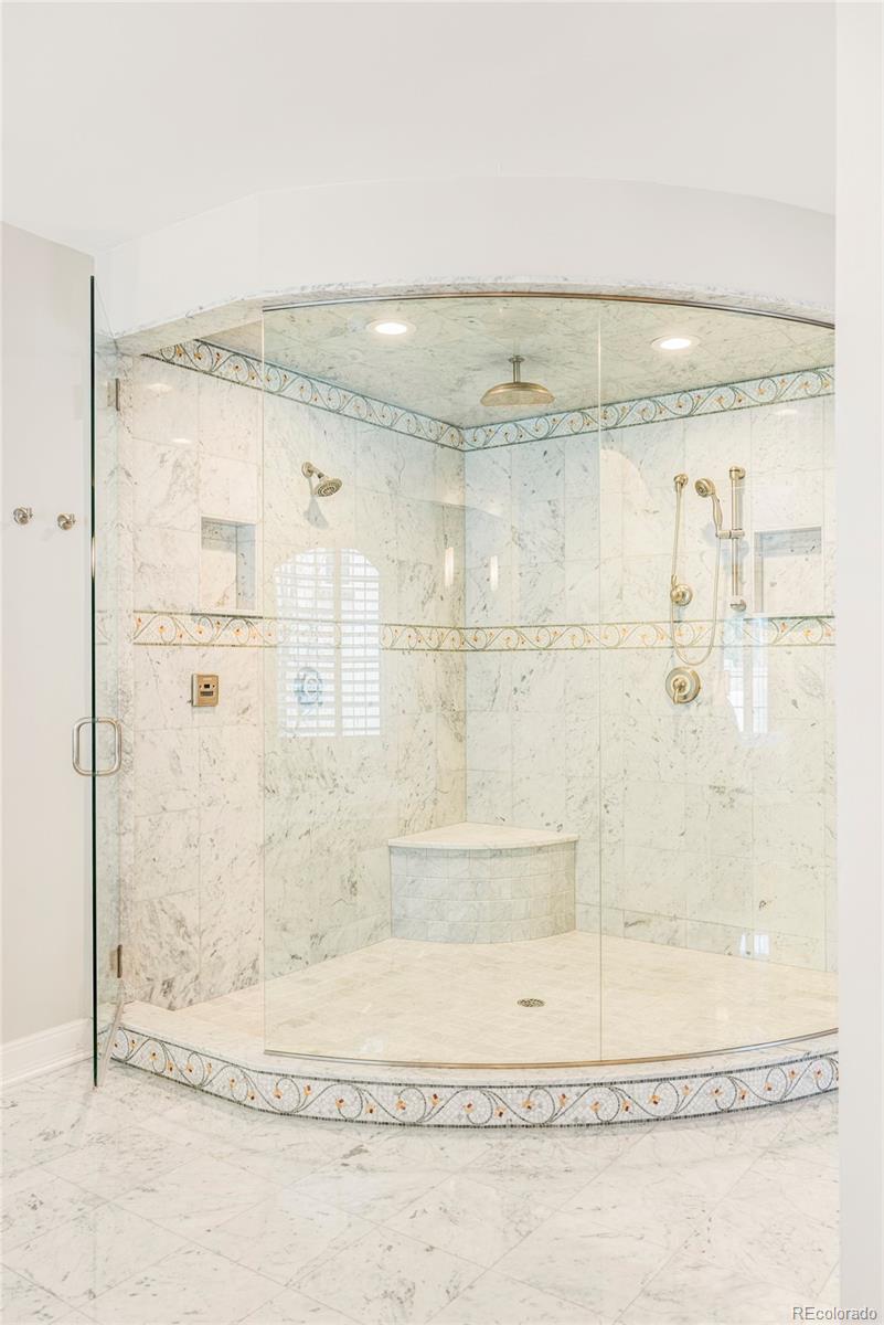 411 Cook Street Denver, CO 80206 - Photo 22 of 40 a bathroom with a shower