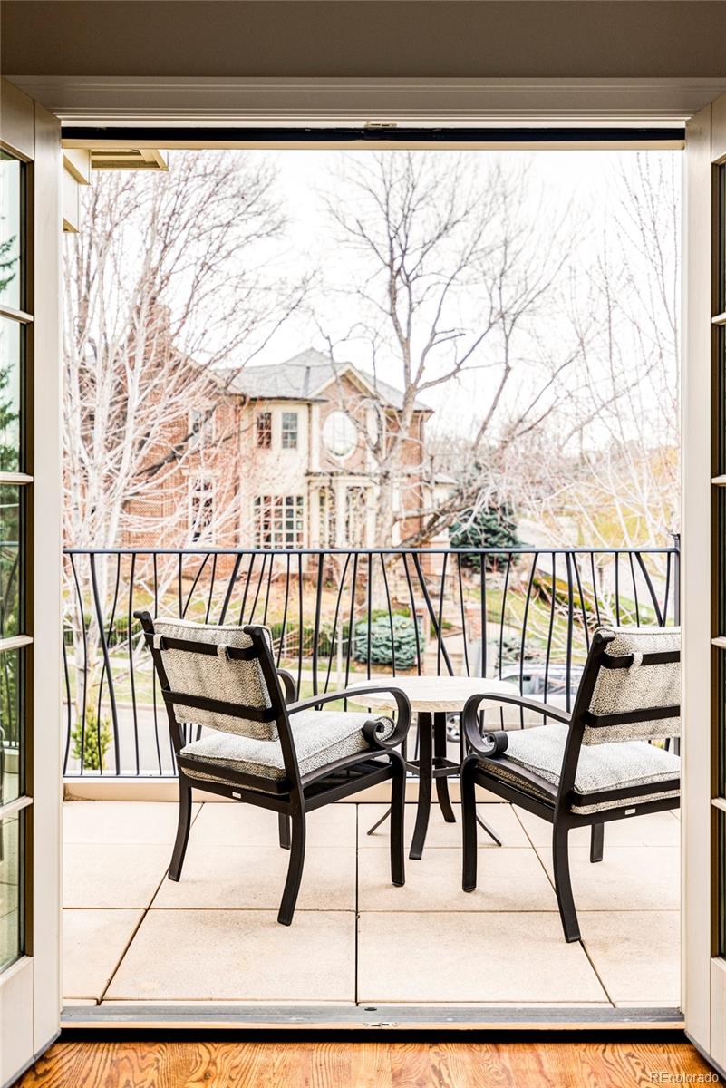 411 Cook Street Denver, CO 80206 - Photo 25 of 40 a view of a chairs and table in patio