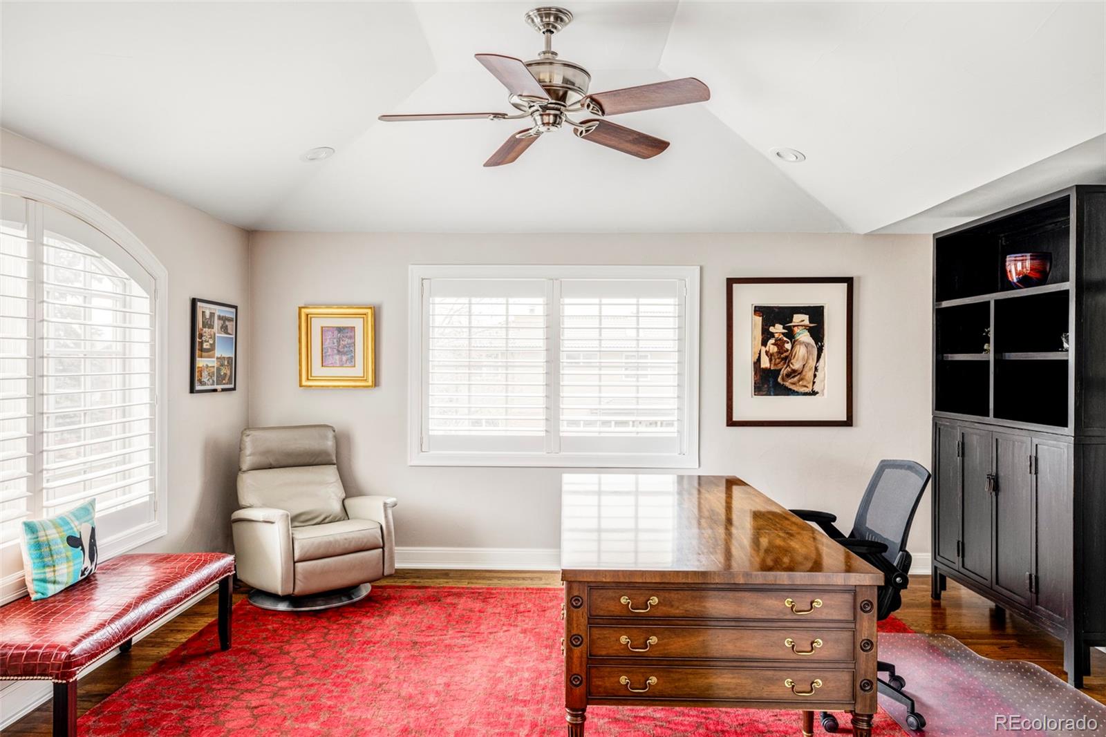 411 Cook Street Denver, CO 80206 - Photo 27 of 40 a living room with furniture and a window