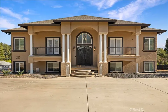 a view of a brick building with many windows