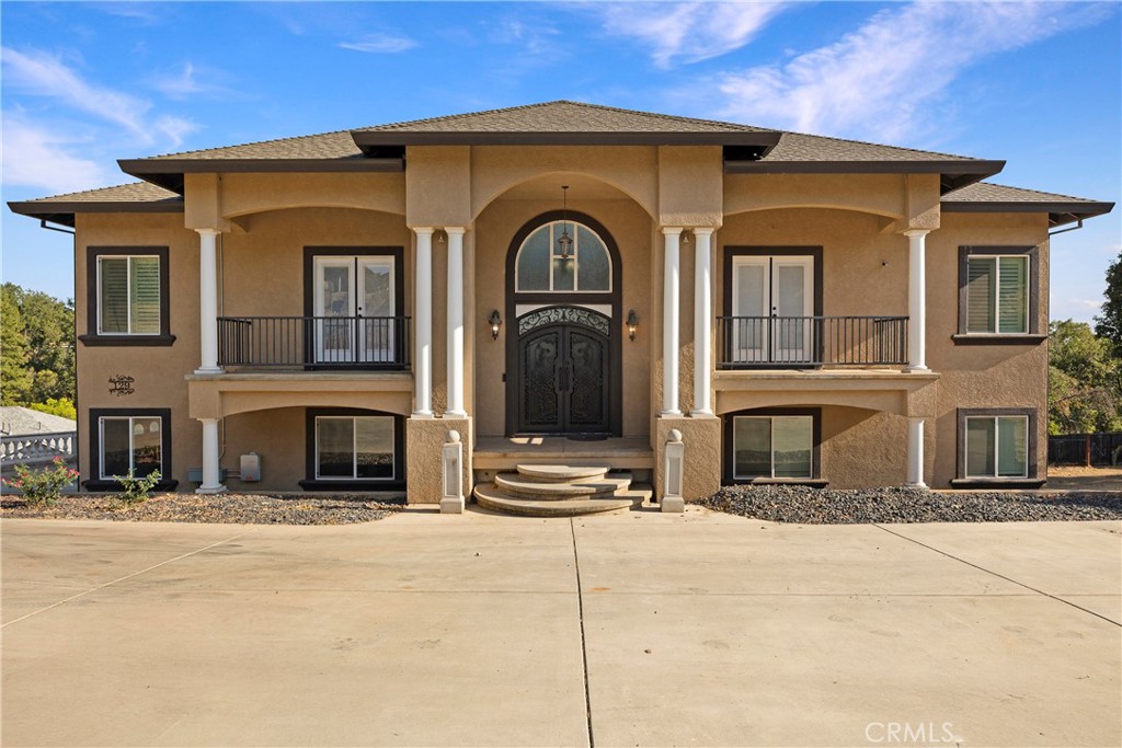 a view of a brick building with many windows