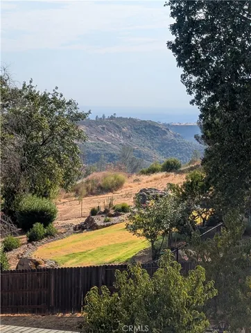 a kitchen with stainless steel appliances granite countertop a refrigerator and a stove