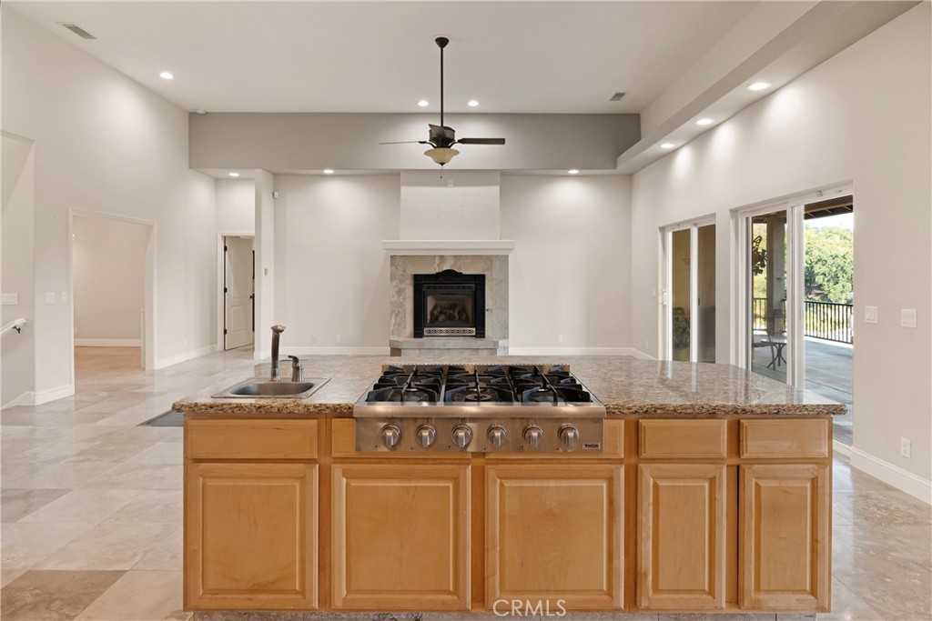 129 Valley Ridge Drive Paradise, CA 95969 - Photo 22 of 66 a kitchen with stainless steel appliances granite countertop a stove a sink and a refrigerator