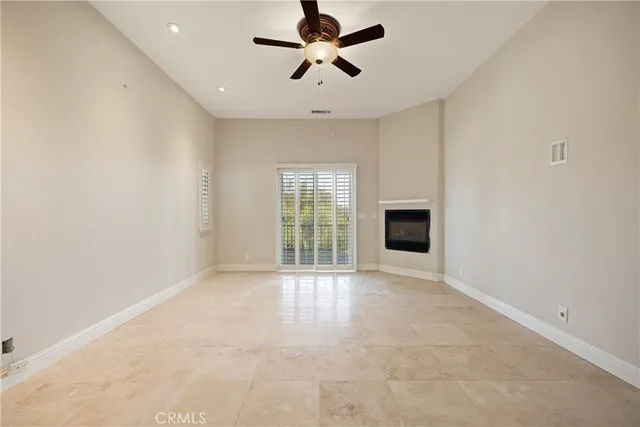 a view of a balcony with wooden floor