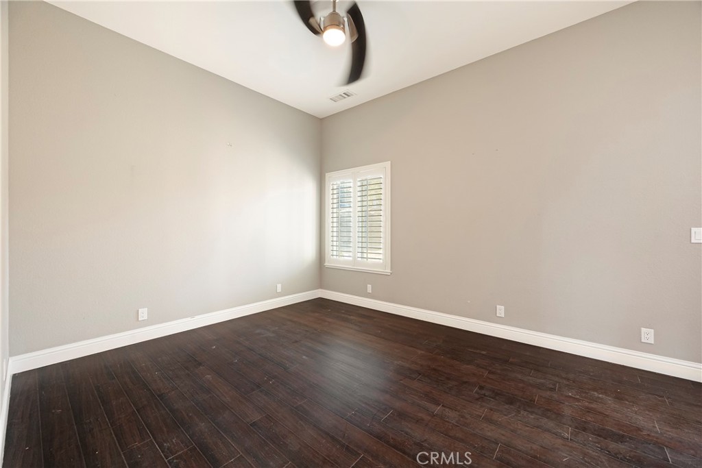 129 Valley Ridge Drive Paradise, CA 95969 - Photo 35 of 66 a view of an empty room with wooden floor and a window