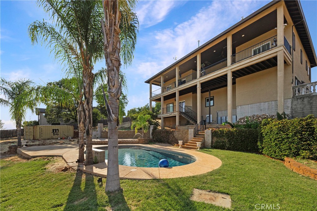 129 Valley Ridge Drive Paradise, CA 95969 - Photo 4 of 66 a view of a house with swimming pool and sitting area