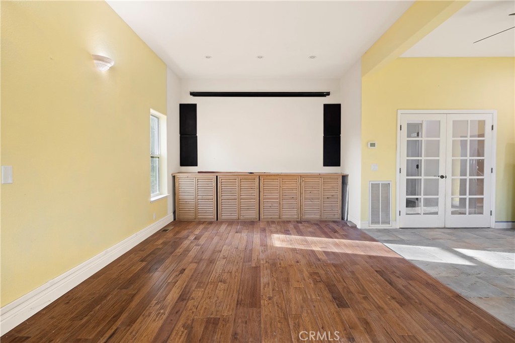 129 Valley Ridge Drive Paradise, CA 95969 - Photo 46 of 66 a view of an empty room with wooden floor and a window