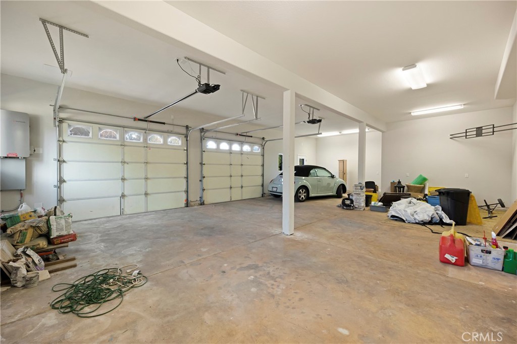 129 Valley Ridge Drive Paradise, CA 95969 - Photo 50 of 66 a view of a garage with parked cars