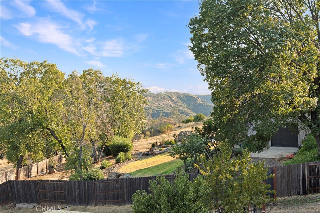 129 Valley Ridge Drive Paradise, CA 95969 - Photo 54 of 66 a view of a yard with wooden fence