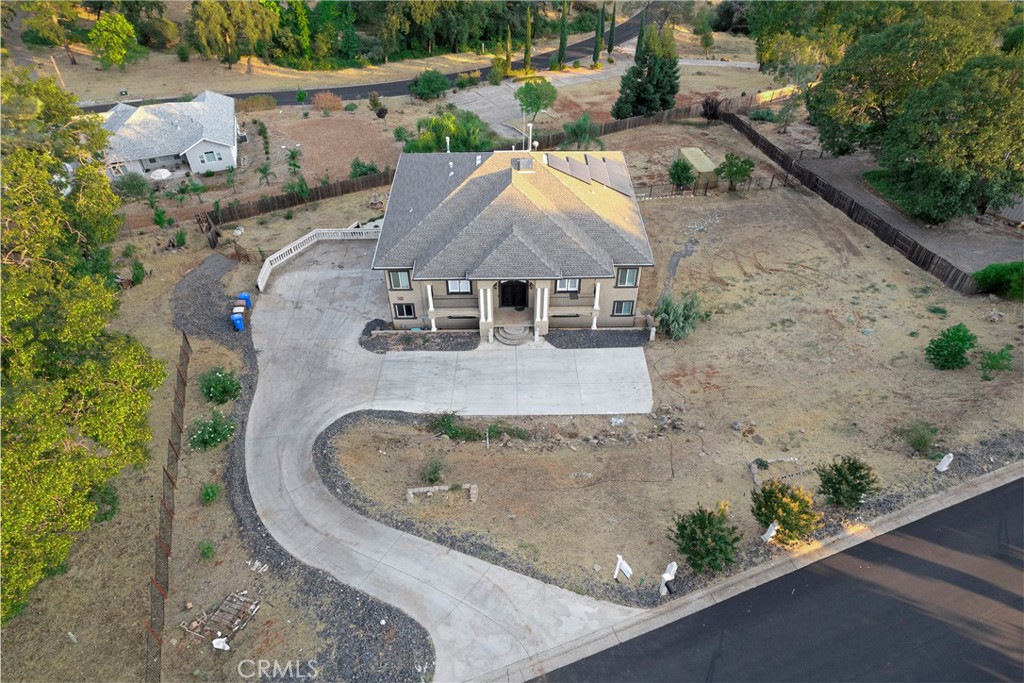 129 Valley Ridge Drive Paradise, CA 95969 - Photo 66 of 66 an aerial view of a house with a yard and balcony
