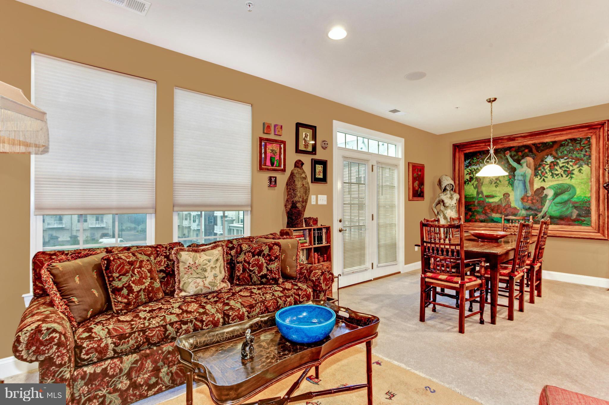 3632 Spring Hollow Lane Frederick, MD 21704 - Photo 16 of 30 a living room with furniture and a large window