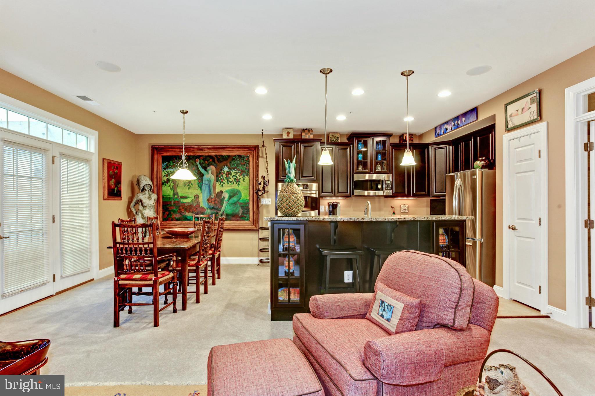 3632 Spring Hollow Lane Frederick, MD 21704 - Photo 17 of 30 a living room with furniture and kitchen view