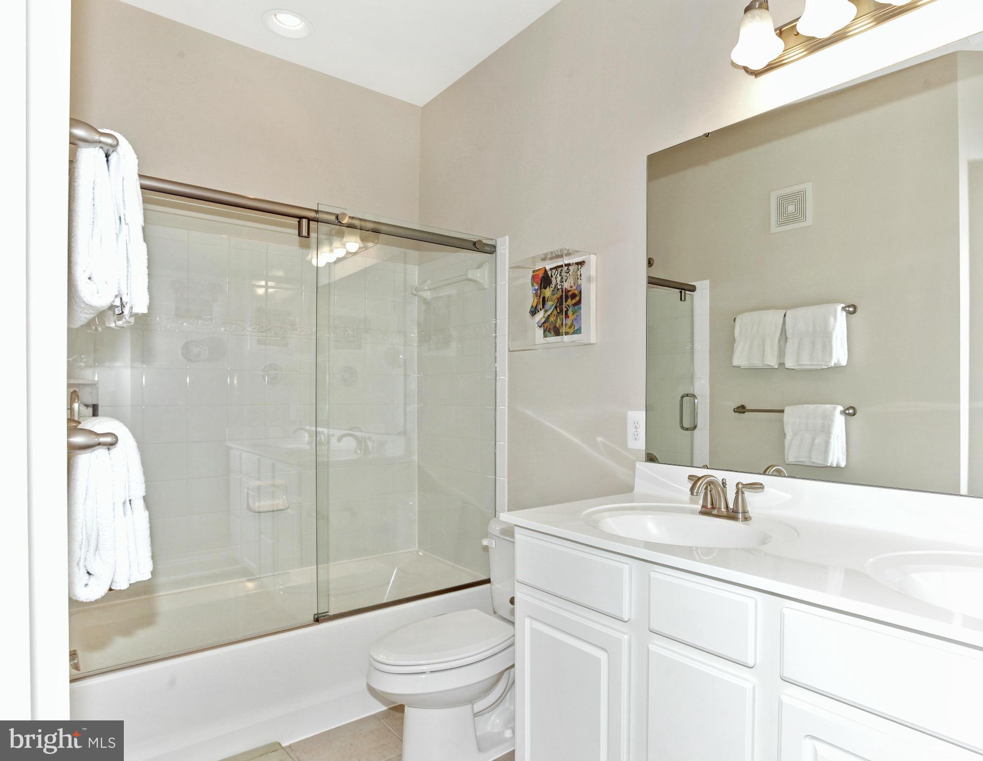 3632 Spring Hollow Lane Frederick, MD 21704 - Photo 19 of 30 a bathroom with a sink toilet and shower