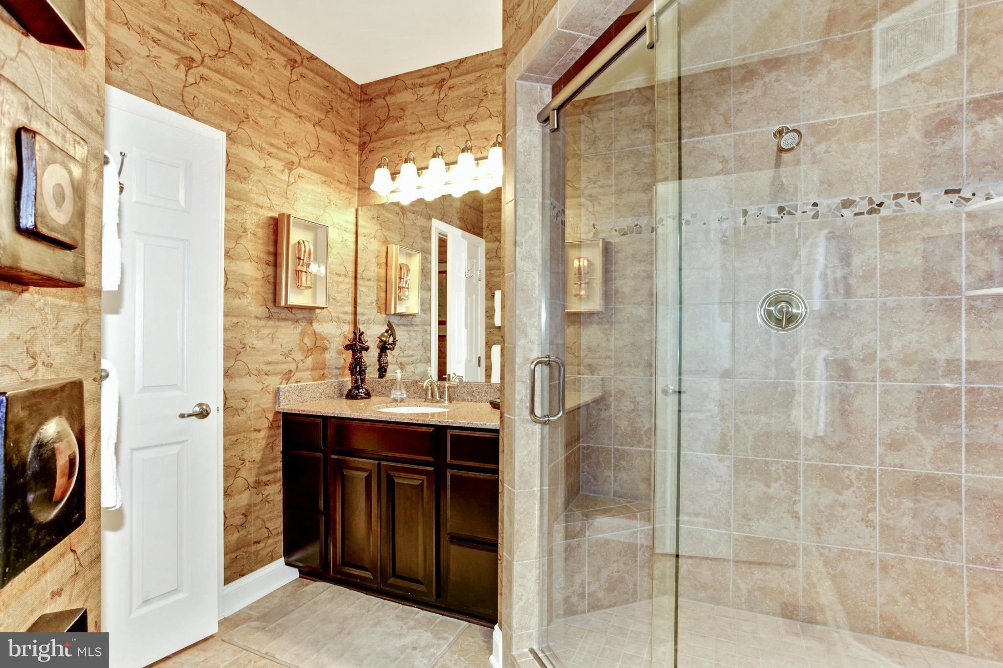 3632 Spring Hollow Lane Frederick, MD 21704 - Photo 26 of 30 a bathroom with a sink and a mirror
