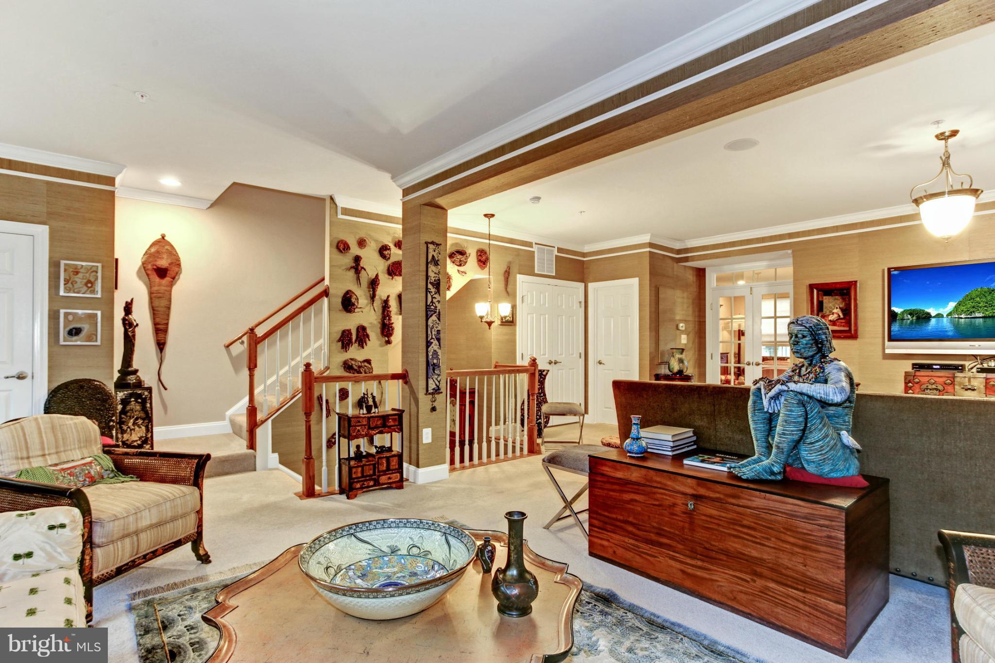 3632 Spring Hollow Lane Frederick, MD 21704 - Photo 7 of 30 a living room with furniture and a flat screen tv