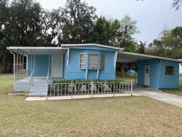 a front view of a house with patio