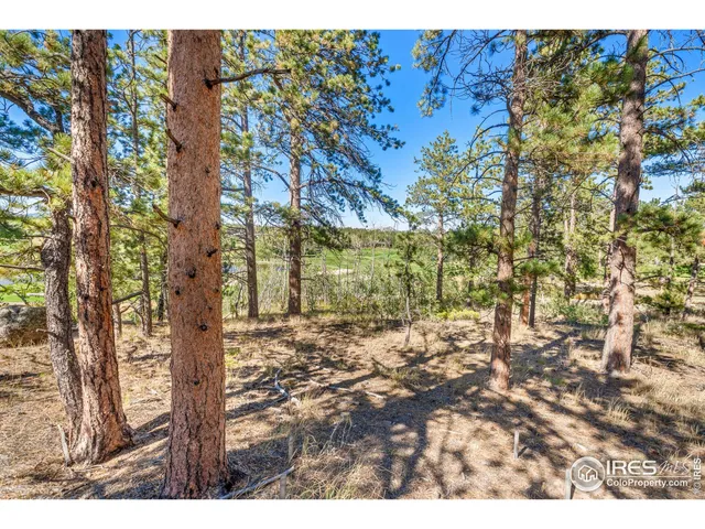 a view of a city with mountains in the background