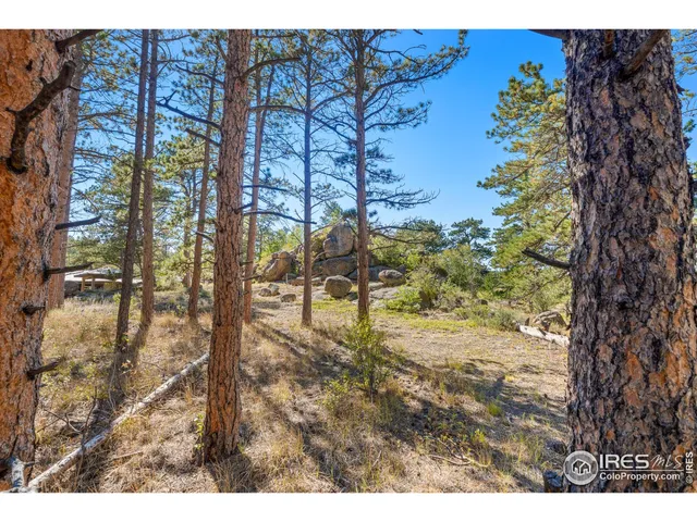 a view of a city with mountains in the background
