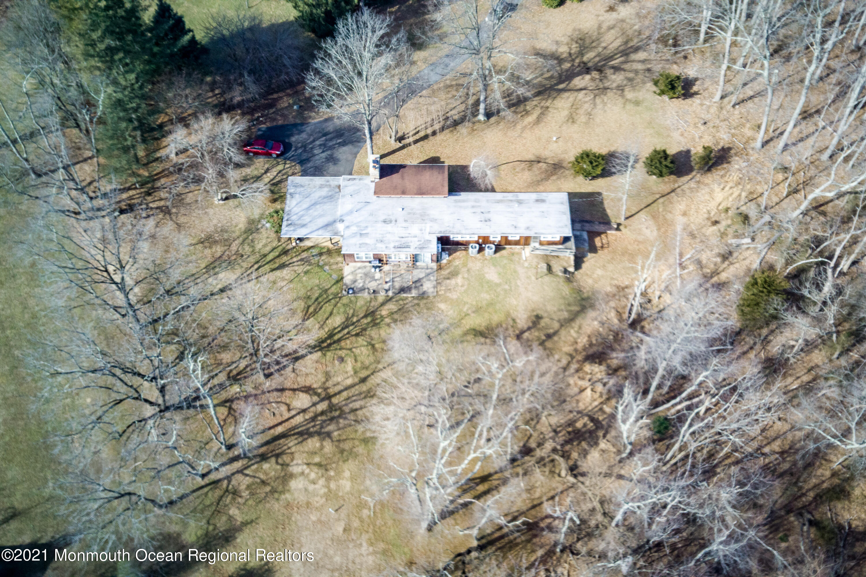 421 Stagecoach Road Clarksburg, NJ 08510 - Photo 14 of 15 a view of a yard covered with snow