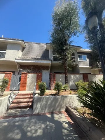 a view of a house with a patio