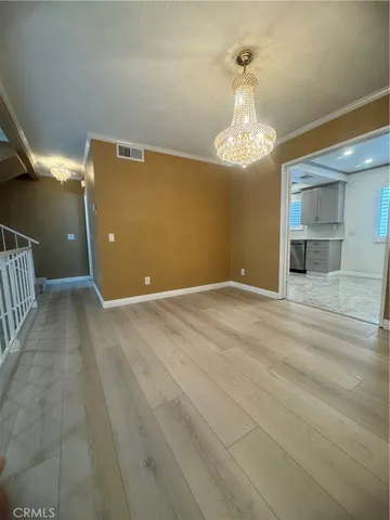 a view of a livingroom with a chandelier
