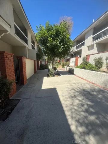 a view of a building with a yard