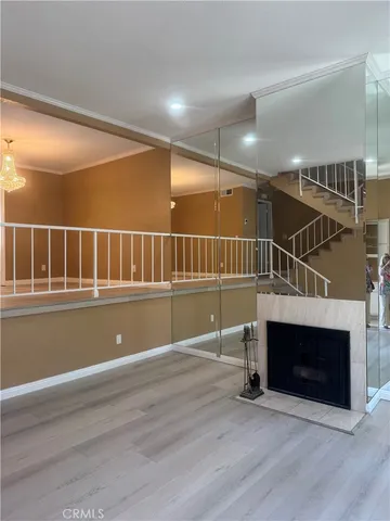 a view of livingroom with furniture wooden floor and window
