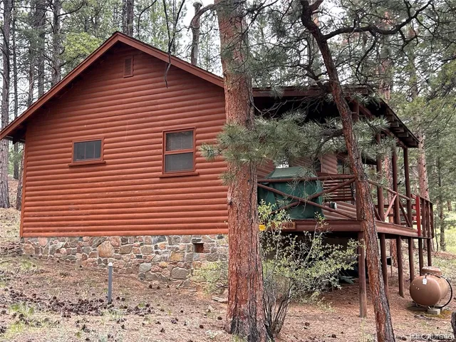 a view of a chairs and tables in the patio