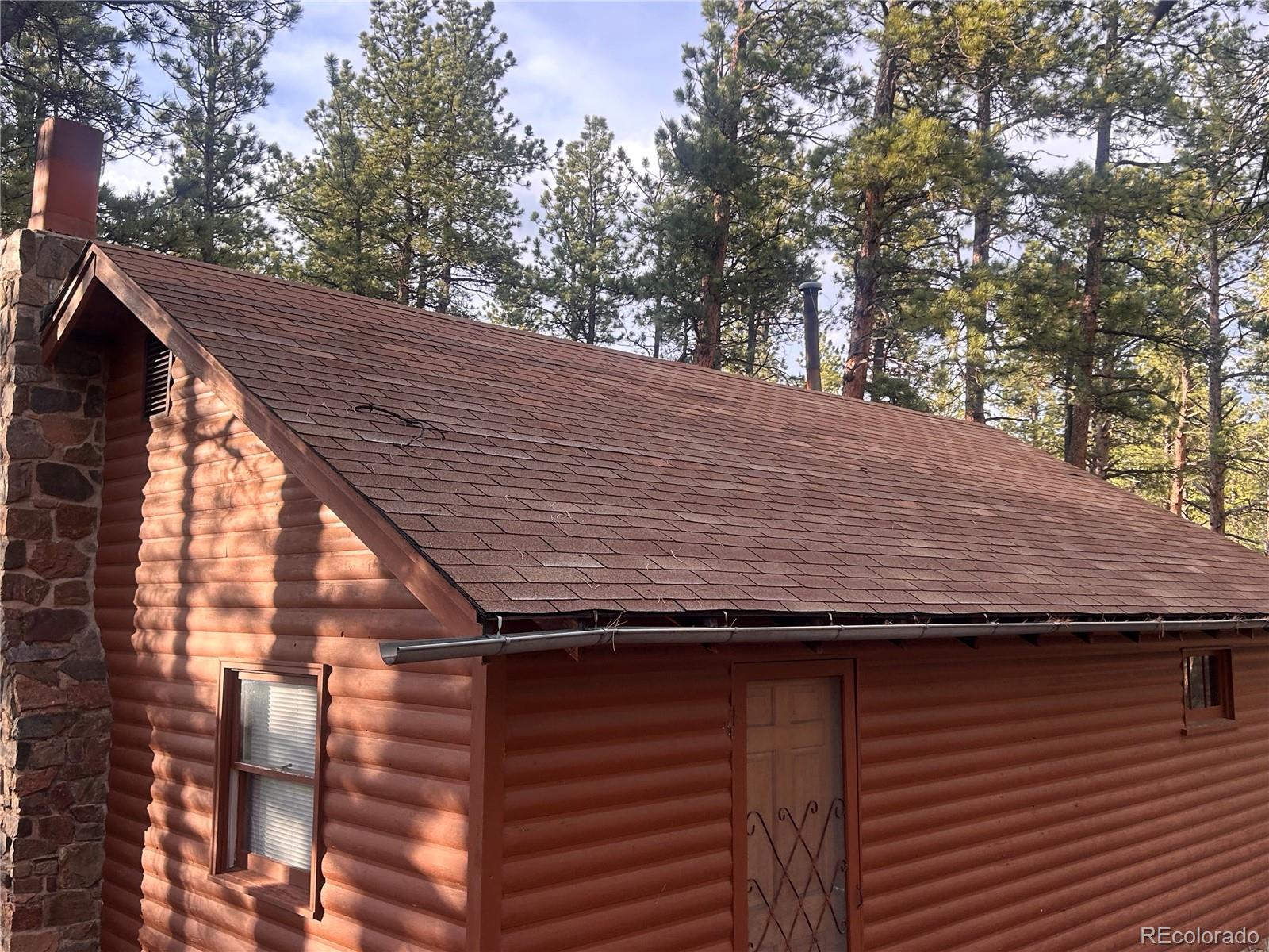 861 Happy Top Road Bailey, CO 80421 - Photo 10 of 29 a backyard of a house