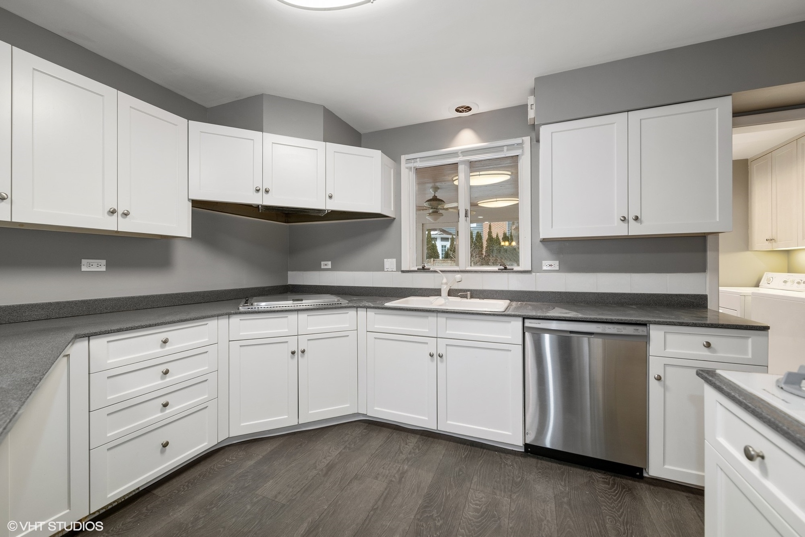 643 Robin Lane Glencoe, IL 60022 - Photo 12 of 32 a kitchen with granite countertop white cabinets and stainless steel appliances
