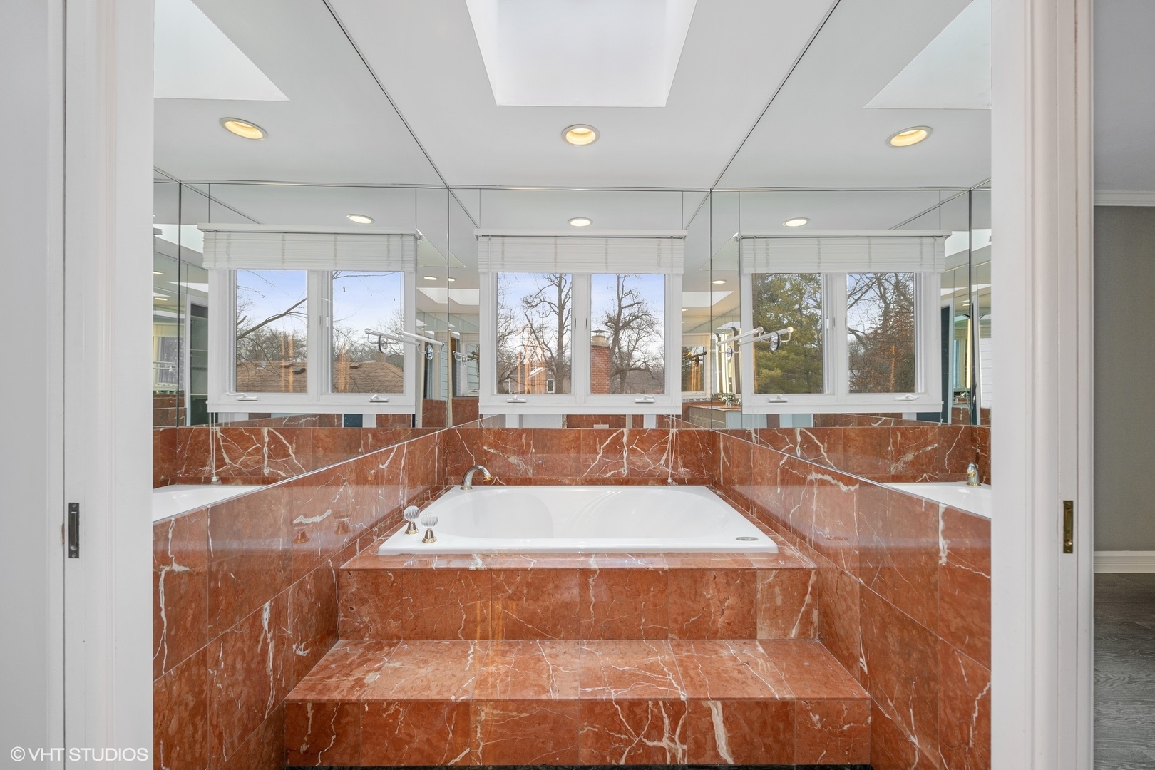 643 Robin Lane Glencoe, IL 60022 - Photo 26 of 32 a large swimming pool with large glass windows and painted walls