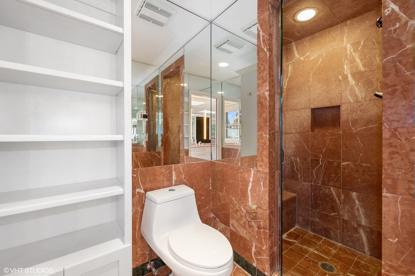 643 Robin Lane Glencoe, IL 60022 - Photo 27 of 32 a bathroom with a toilet and a shower