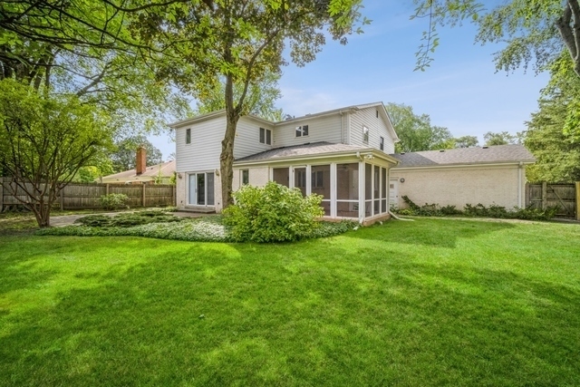 643 Robin Lane Glencoe, IL 60022 - Photo 32 of 32 a front view of a house with a yard and lake view