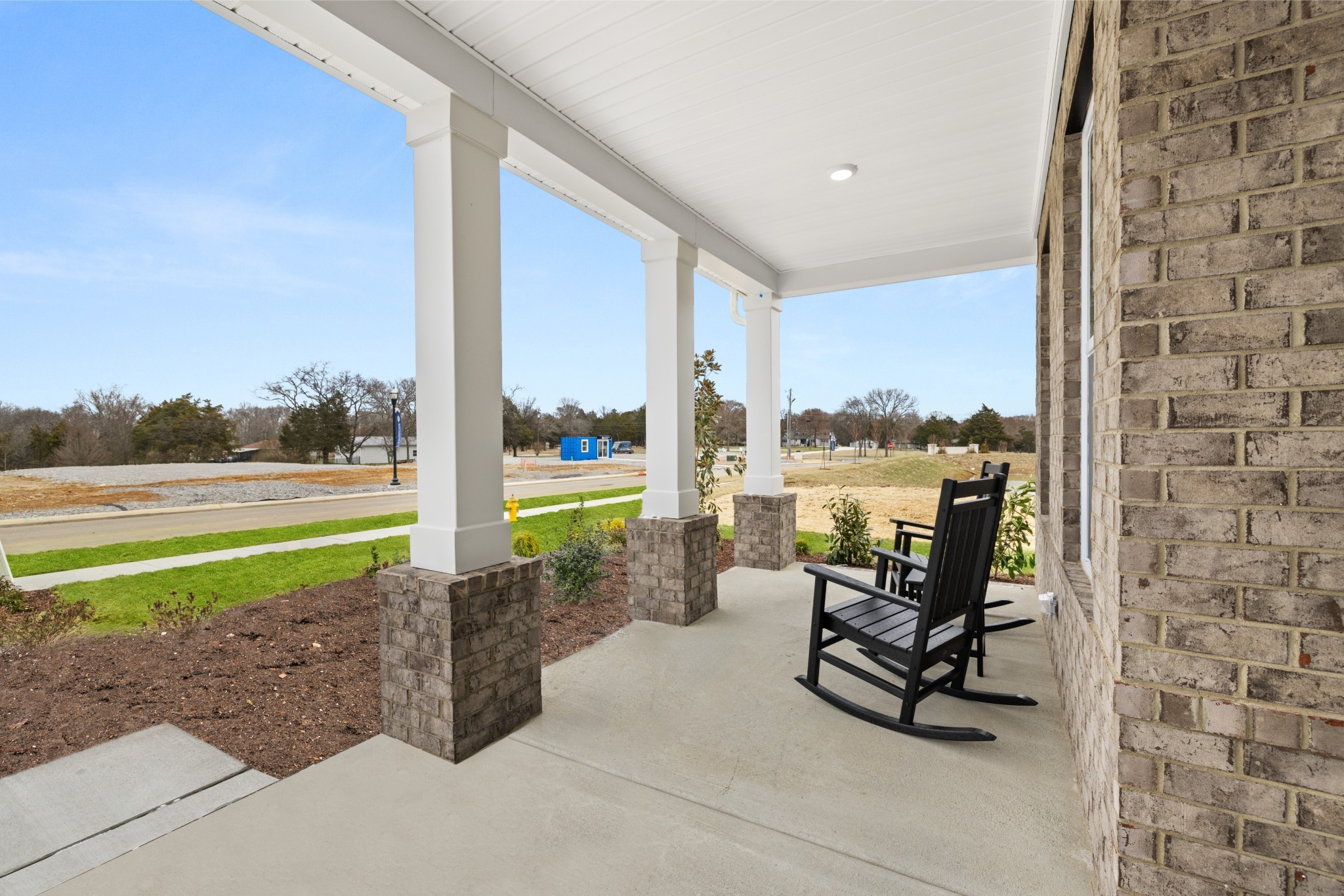 1237 Leavell Lane Murfreesboro, TN 37130 - Photo 2 of 53 a view of a terrace with a bench and floor to ceiling window