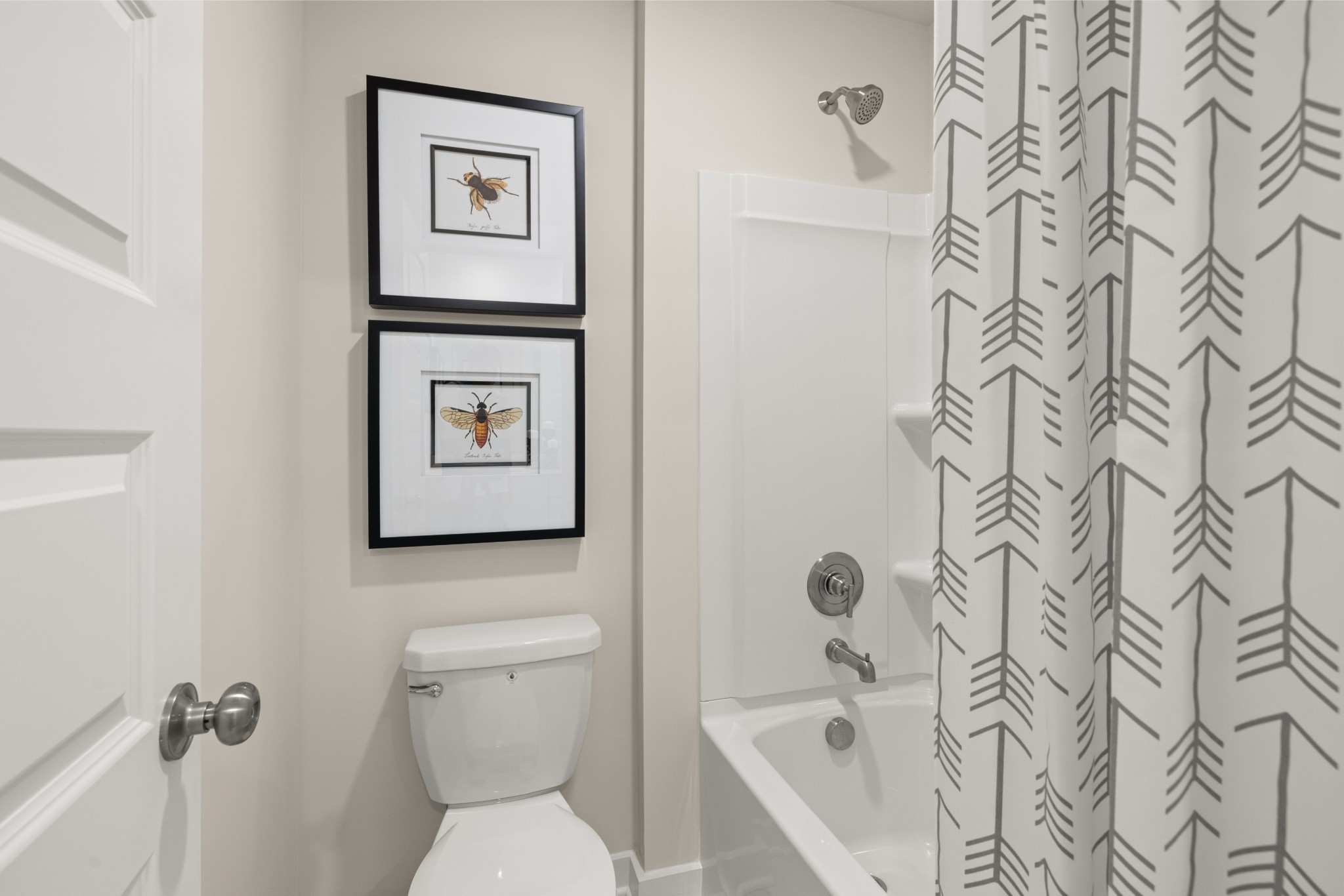 1237 Leavell Lane Murfreesboro, TN 37130 - Photo 53 of 53 a bathroom with a toilet and a shower curtain