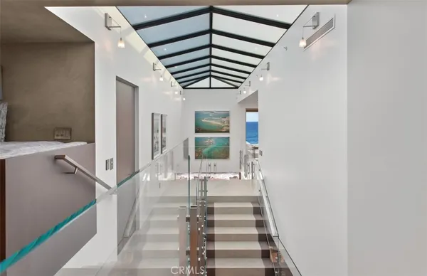 a spacious bedroom with a bed and a walk in closet