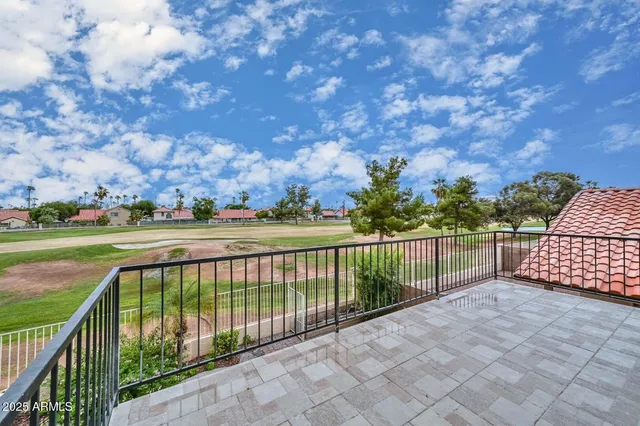 a view of a lake with a yard