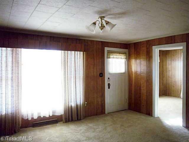 3111 Central High Point High Point, NC 27260 - Photo 5 of 13 Living Room. Lots of windows and light in the formal living room.