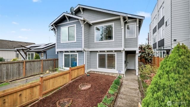 a house view with a garden space