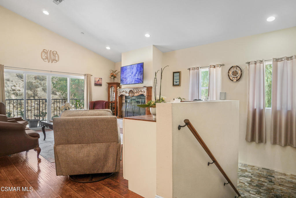 7368 Santa Susana Pass Road Simi Valley, CA 93063 - Photo 17 of 48 a living room with furniture and a flat screen tv