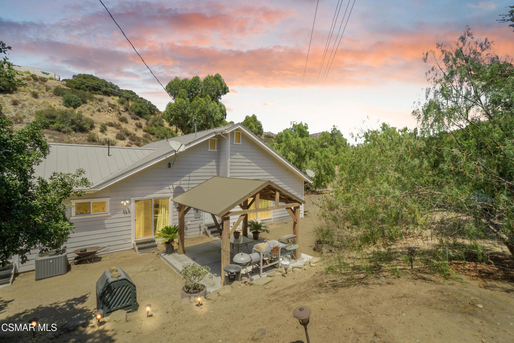 7368 Santa Susana Pass Road Simi Valley, CA 93063 - Photo 2 of 48 a view of a house with a patio