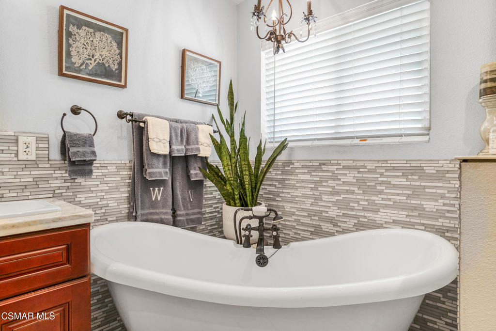 7368 Santa Susana Pass Road Simi Valley, CA 93063 - Photo 23 of 48 a bathroom with a bathtub and a sink