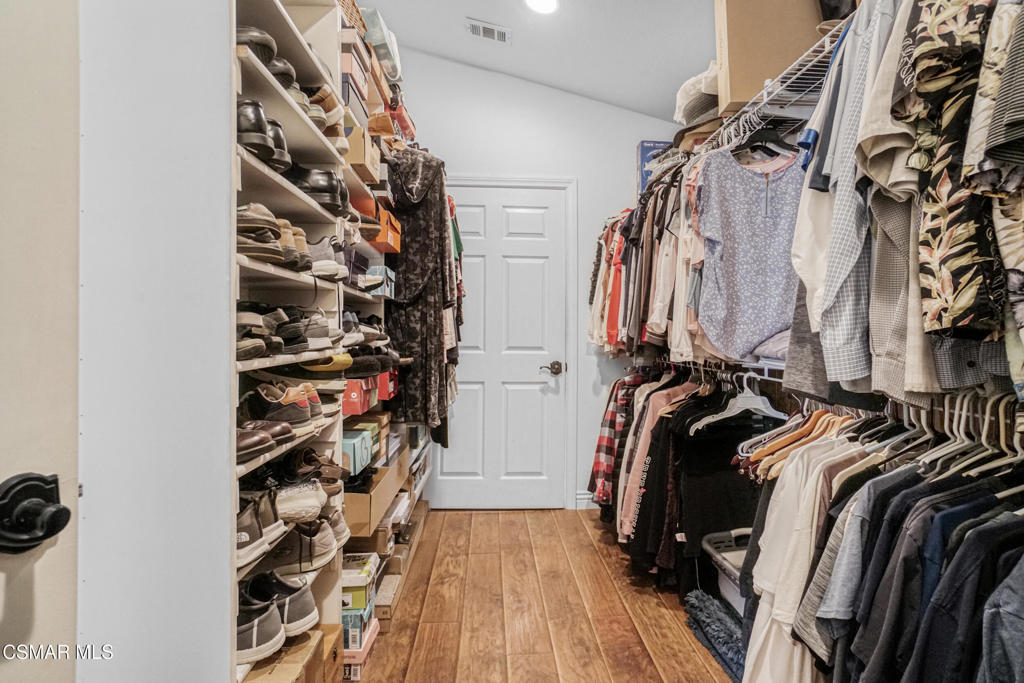7368 Santa Susana Pass Road Simi Valley, CA 93063 - Photo 24 of 48 a view of walk in closet with clothes and shoes