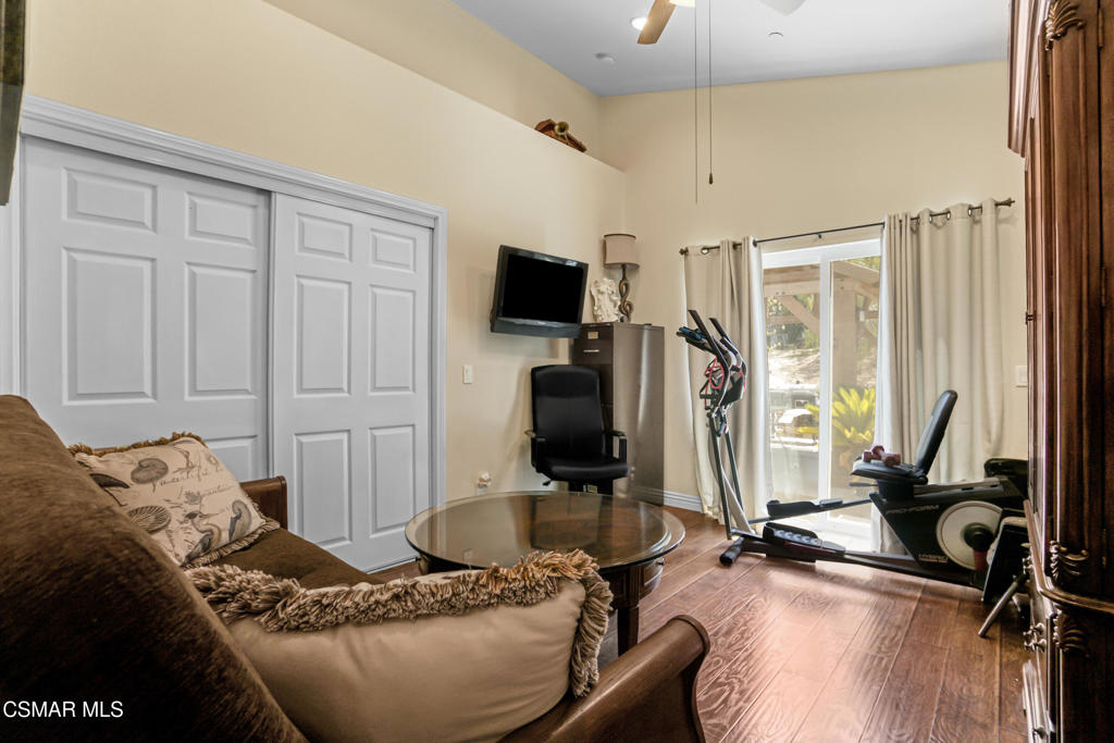 7368 Santa Susana Pass Road Simi Valley, CA 93063 - Photo 26 of 48 a room with furniture or window and a flat screen tv