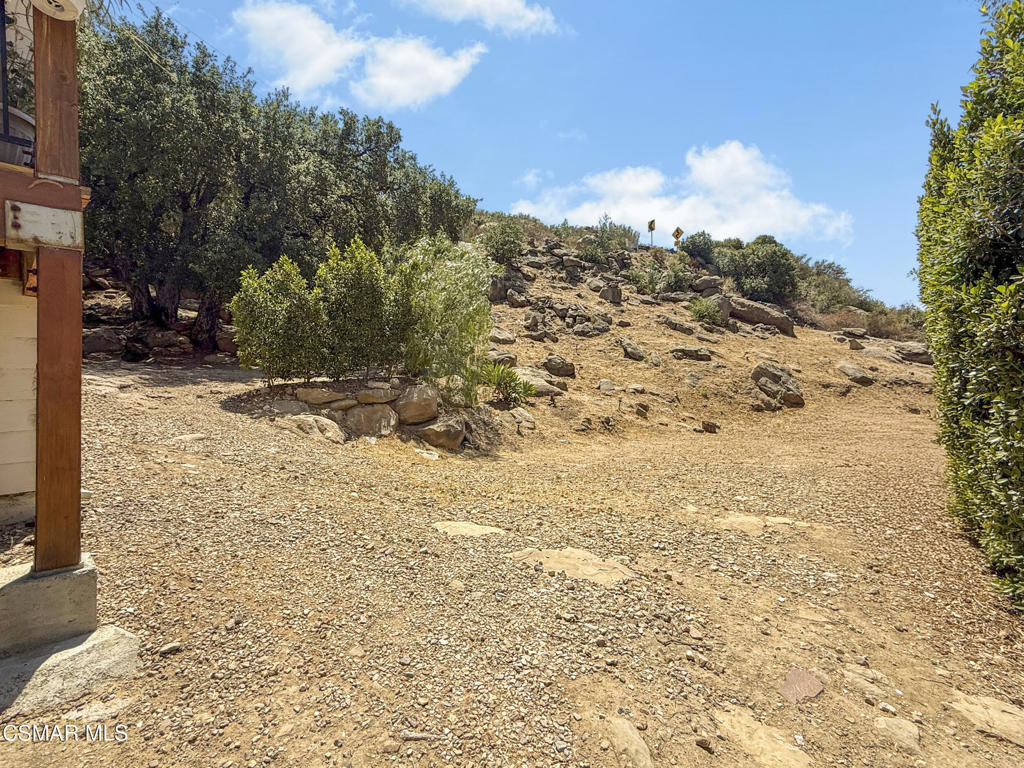 7368 Santa Susana Pass Road Simi Valley, CA 93063 - Photo 43 of 48 a view of a yard with wooden fence