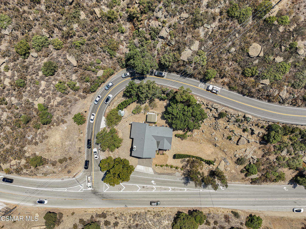 7368 Santa Susana Pass Road Simi Valley, CA 93063 - Photo 46 of 48 an aerial view of a house with a yard and large trees